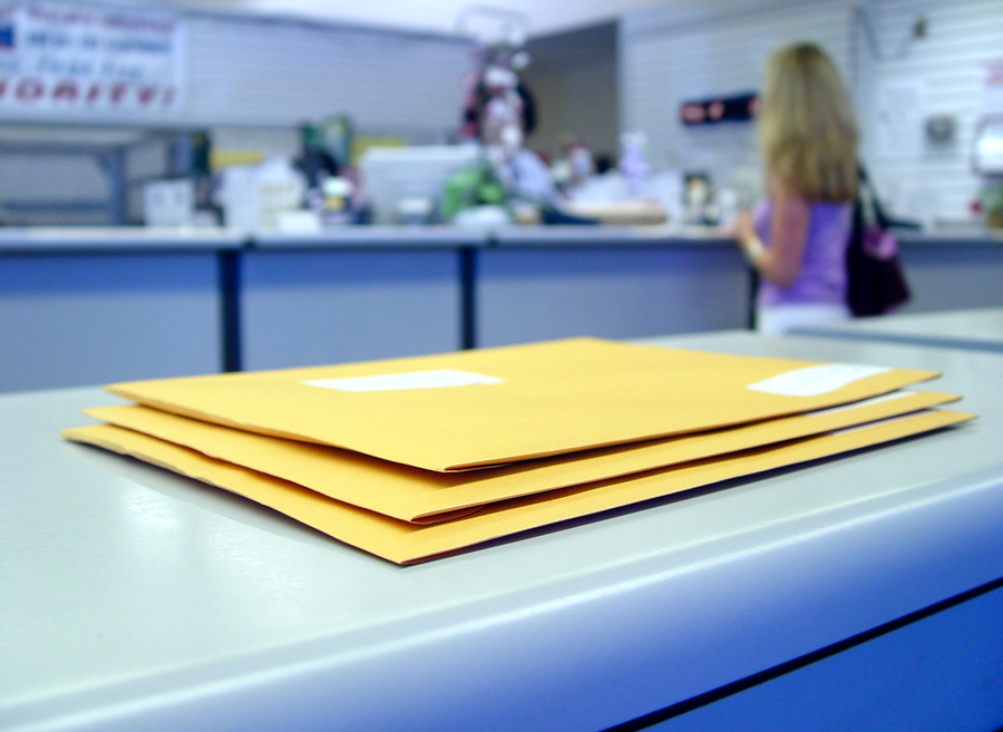 Envelopes on a counter.